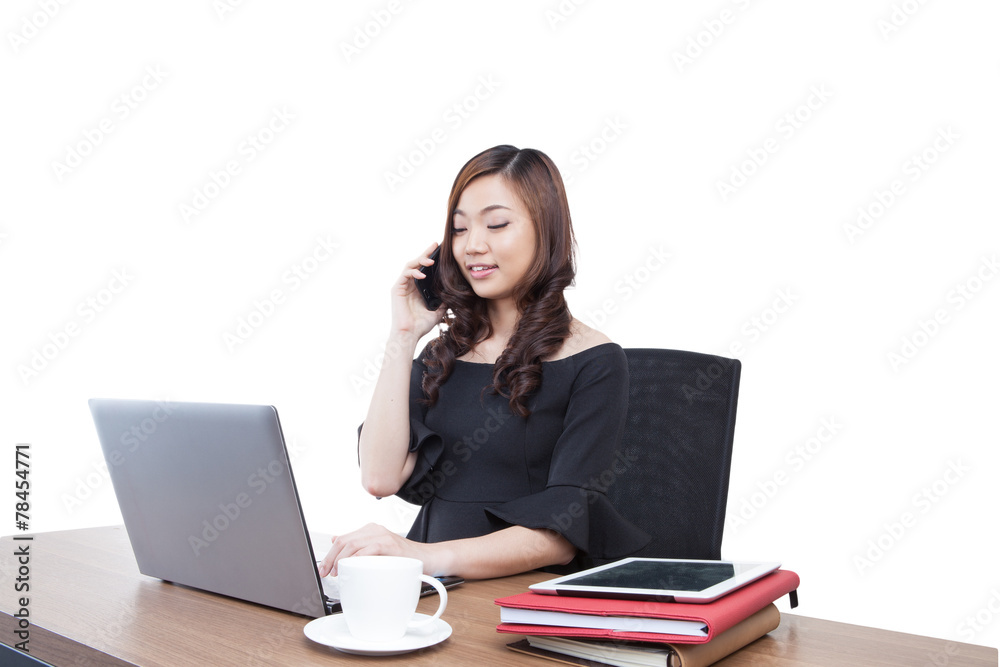 Beautiful smiling businesswoman talking on a cellphone Beautiful smiling businesswoman talking on a cellphone