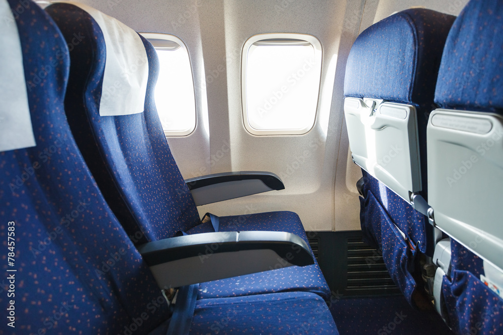 Fototapeta premium fotele tekstylne w sekcji klasy ekonomicznej samolotu