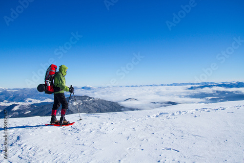 Winter hiking in snowshoes.