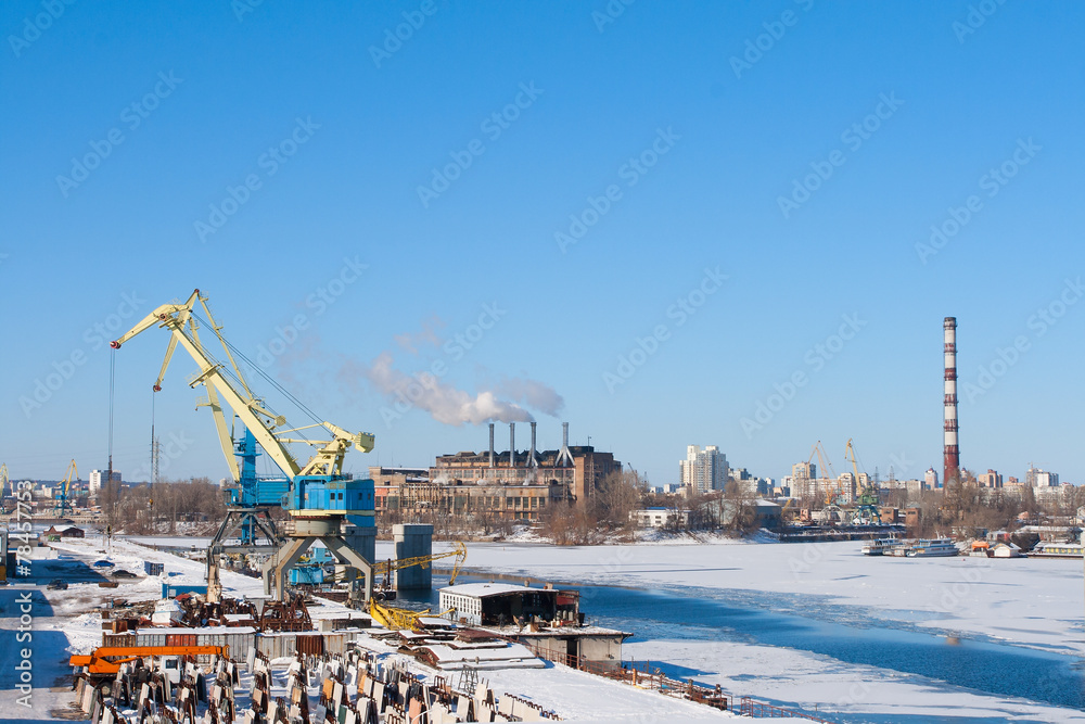view to empty cargo dock with cranes and containers
