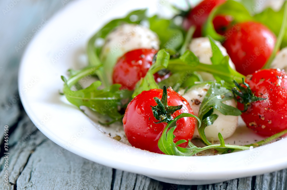 Salad with mozzarella and tomatos Salad with mozzarella and tomatos