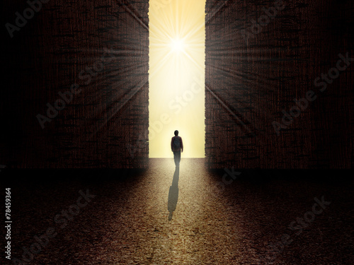 Man standing in front of the light