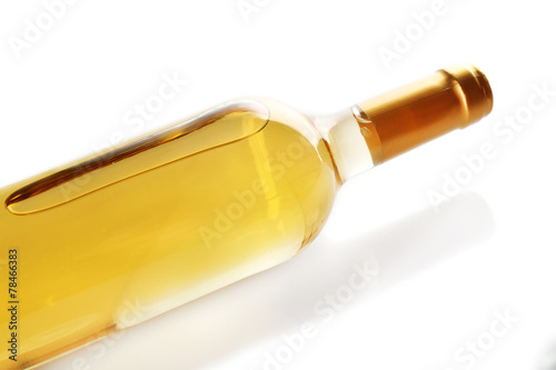 Lying wine bottle, isolated on white
