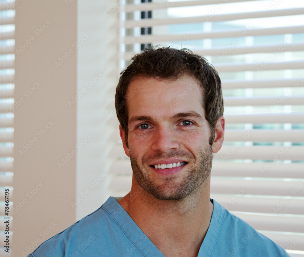 Profile of physician in scrubs Profile of physician in scrubs