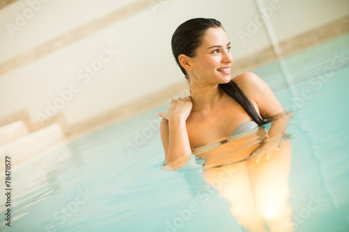 Young woman in the pool