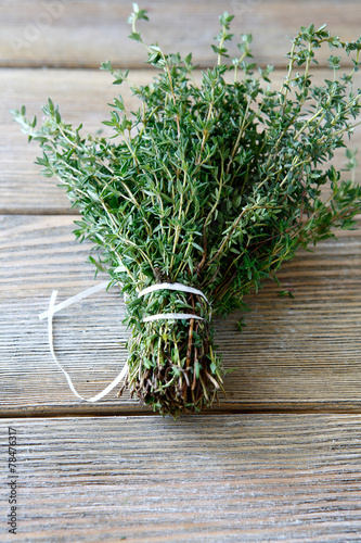 Fragrant thyme on wooden boards