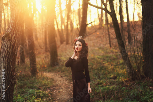 Beauty summer girl outdoors enjoying nature alone. Sunlight