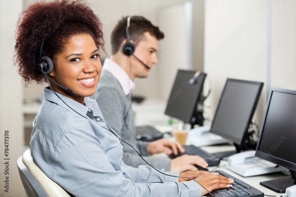 Customer Service Representatives Working In Office Customer Service Representatives Working In Office