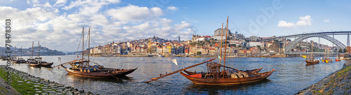 The Rabelo Boats and the Dom Luis I Bridge. Porto, Portugal photo