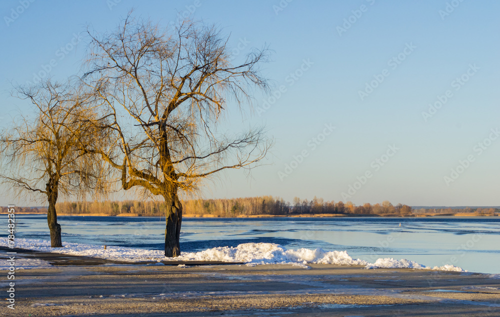 Winter view on the Dnieper River near Kiev at sunset Winter view on the Dnieper River near Kiev at sunset