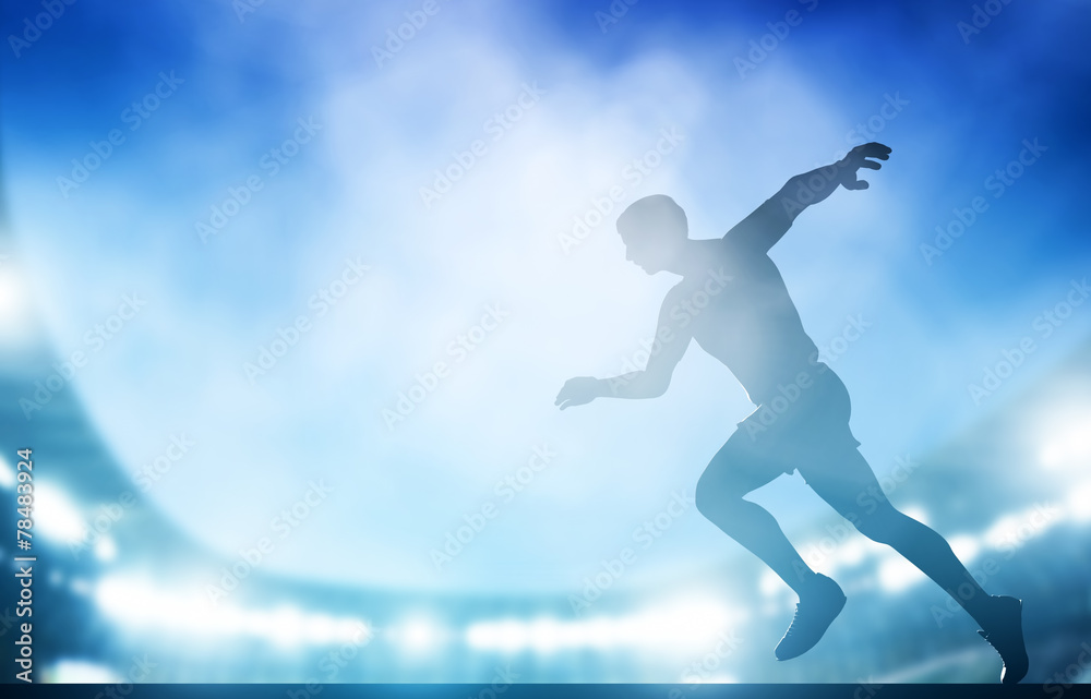 Start of the run on the stadium in night lights. Athletics Start of the run on the stadium in night lights. Athletics