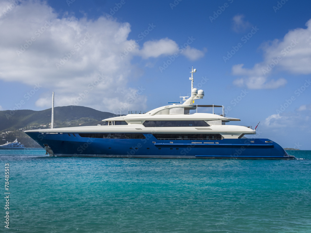 A large private motor yacht under way out at sea