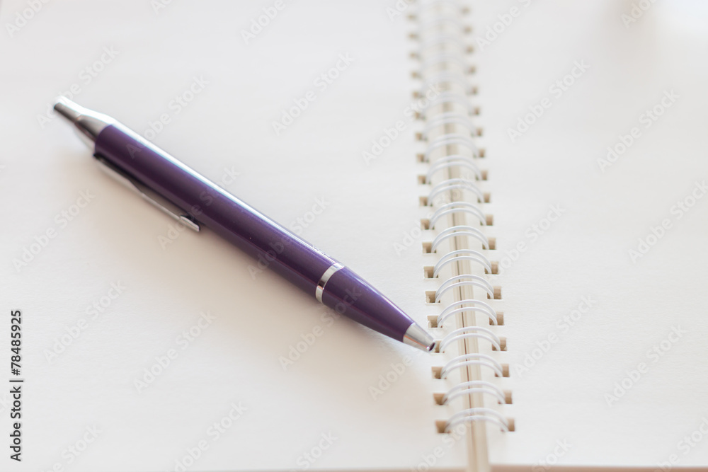 Pen and blank spiral notebook Pen and blank spiral notebook