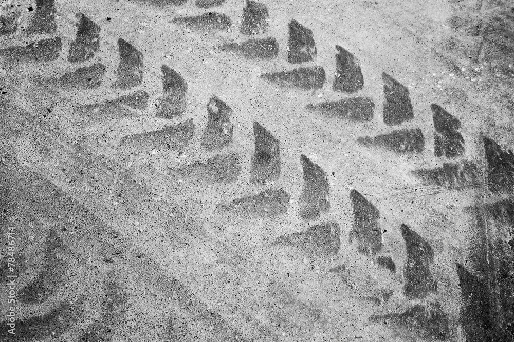 Tire track pattern, abstract asphalt road fragment Tire track pattern, abstract asphalt road fragment