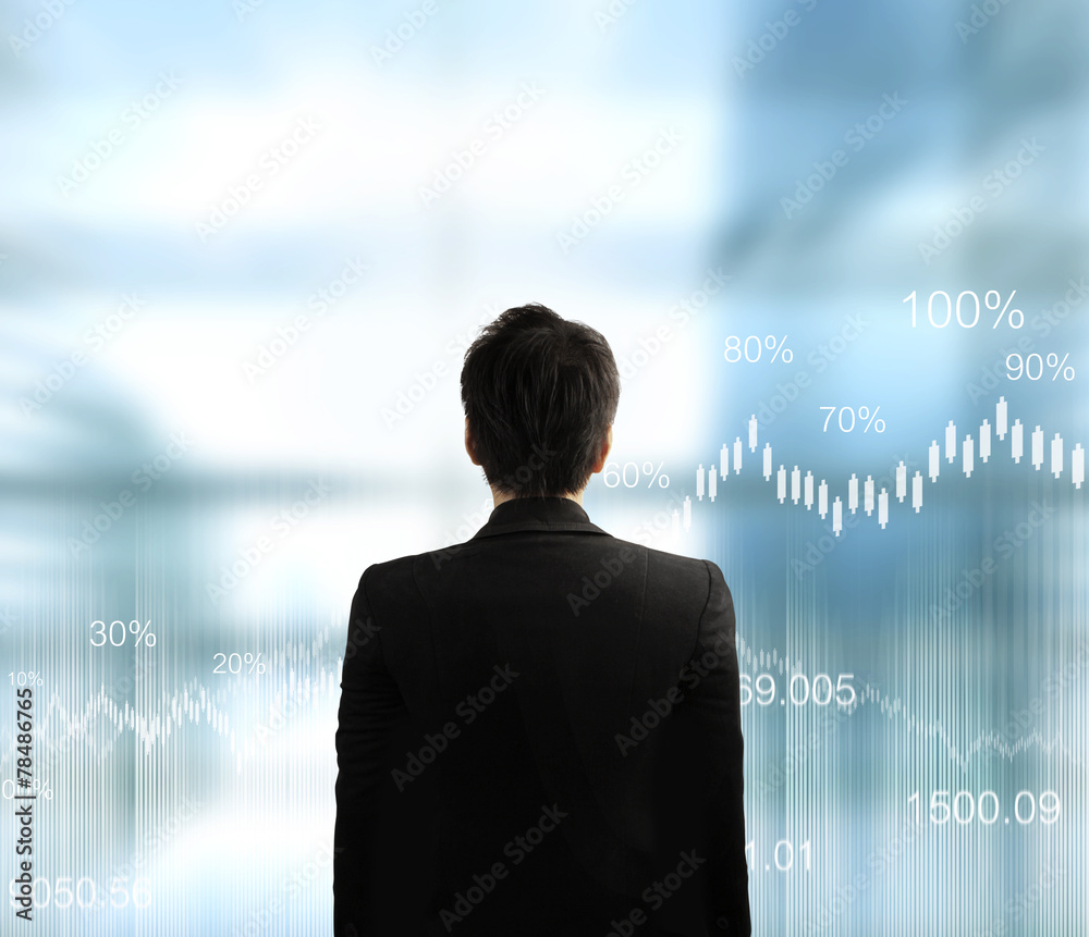 Businessman with financial symbols Businessman with financial symbols