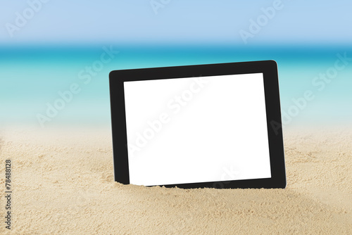 Digital Tablet On Sand