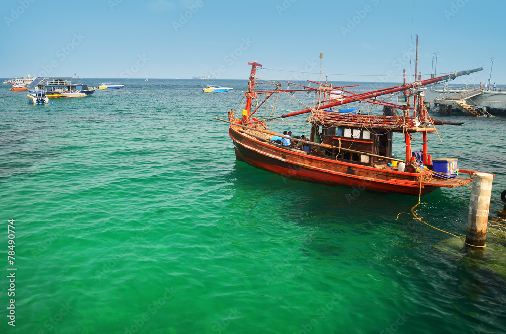 Boats in green sea water, Thailand