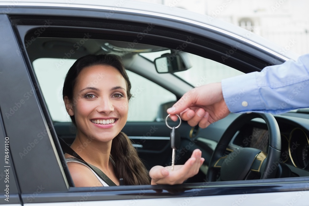 Young woman getting her key