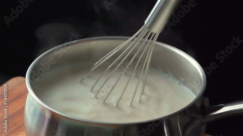Slow motion of hot milk. Find similar in our portfolio.