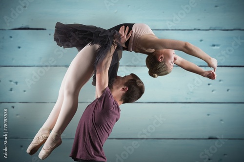 Composite image of ballet partners dancing