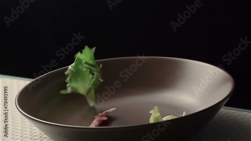 Slow motion of salad. Find similar in our portfolio.