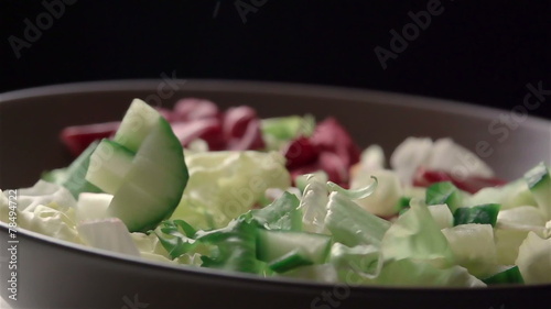 Slow motion of salad. Find similar in our portfolio.