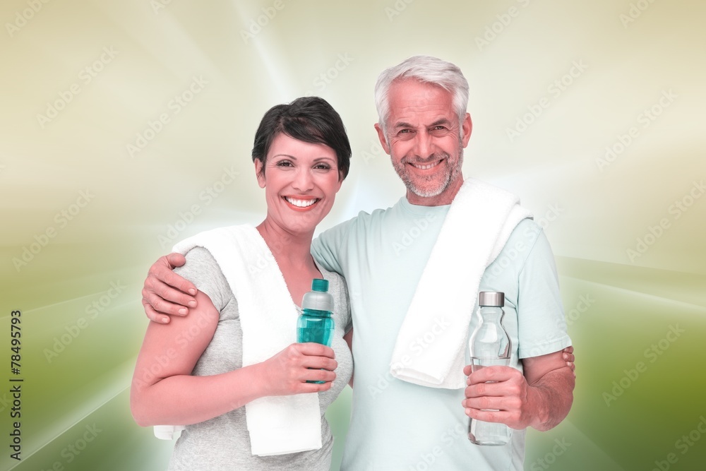 Composite image of portrait of a happy fit couple Composite image of portrait of a happy fit couple