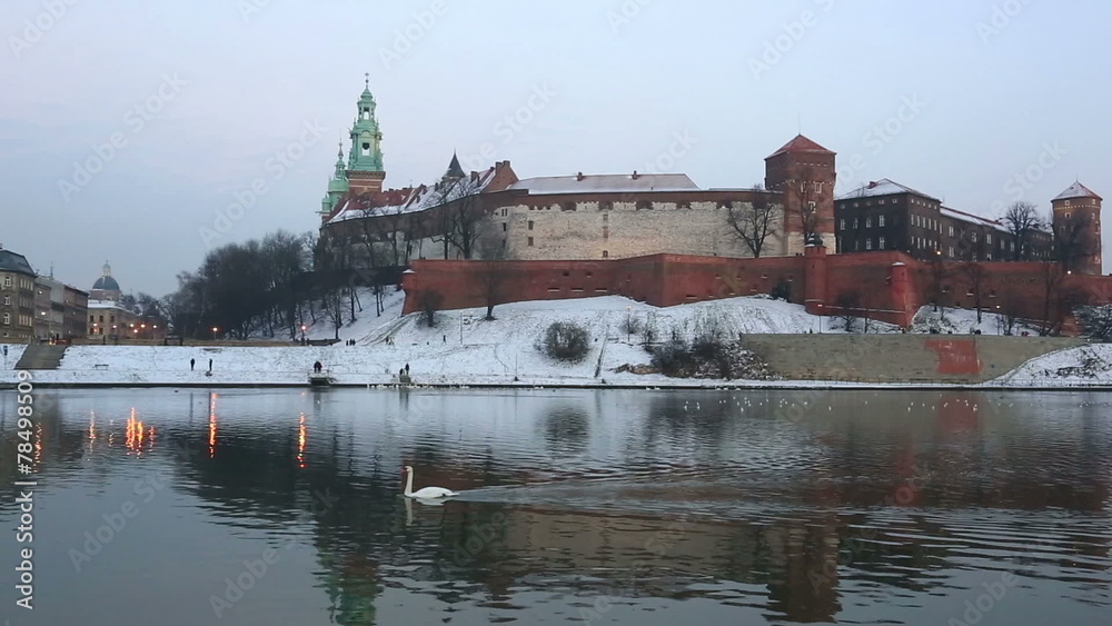 river Vistula against Wawel castle in winter twilight river Vistula against Wawel castle in winter twilight