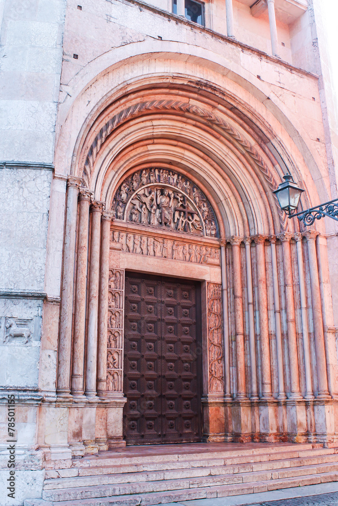 A portal of the Baptistery of Parma, built with pink marble