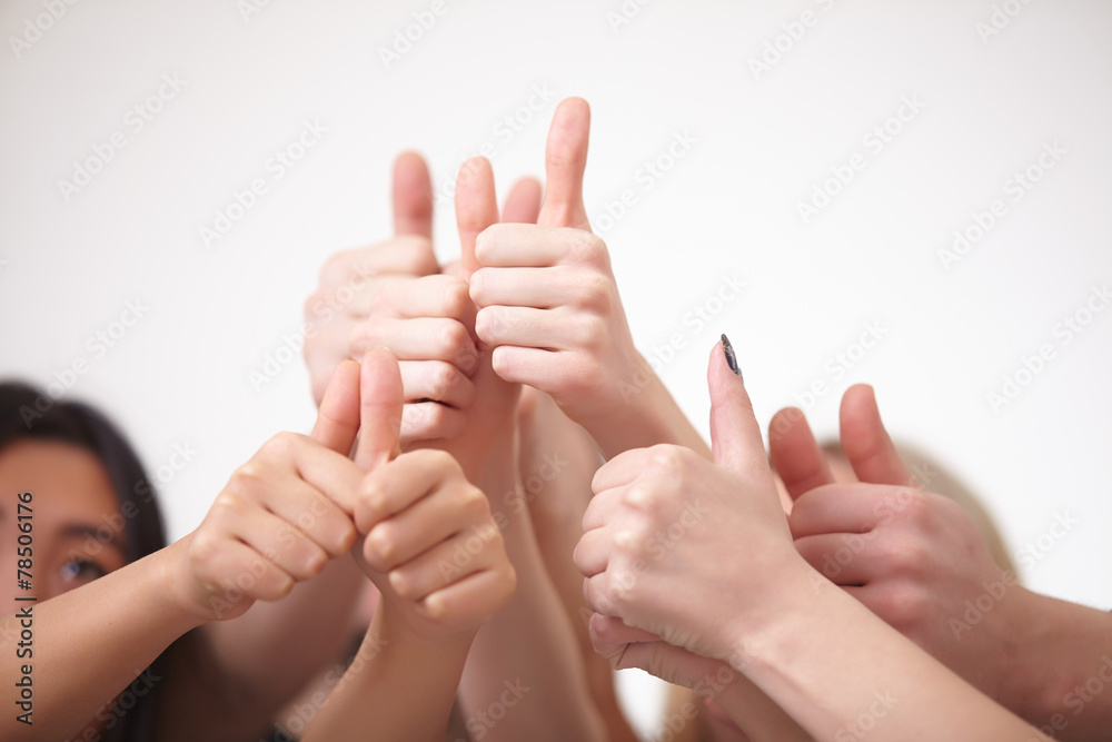 a group of young people, students stand together, show the thumb a group of young people, students stand together, show the thumb