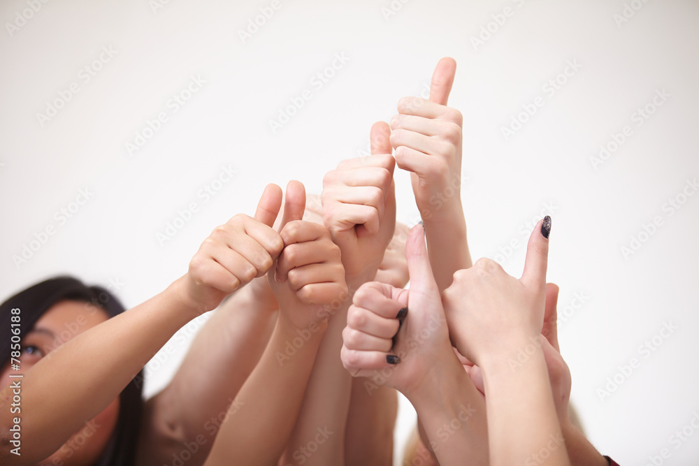 a group of young people, students stand together, show the thumb a group of young people, students stand together, show the thumb