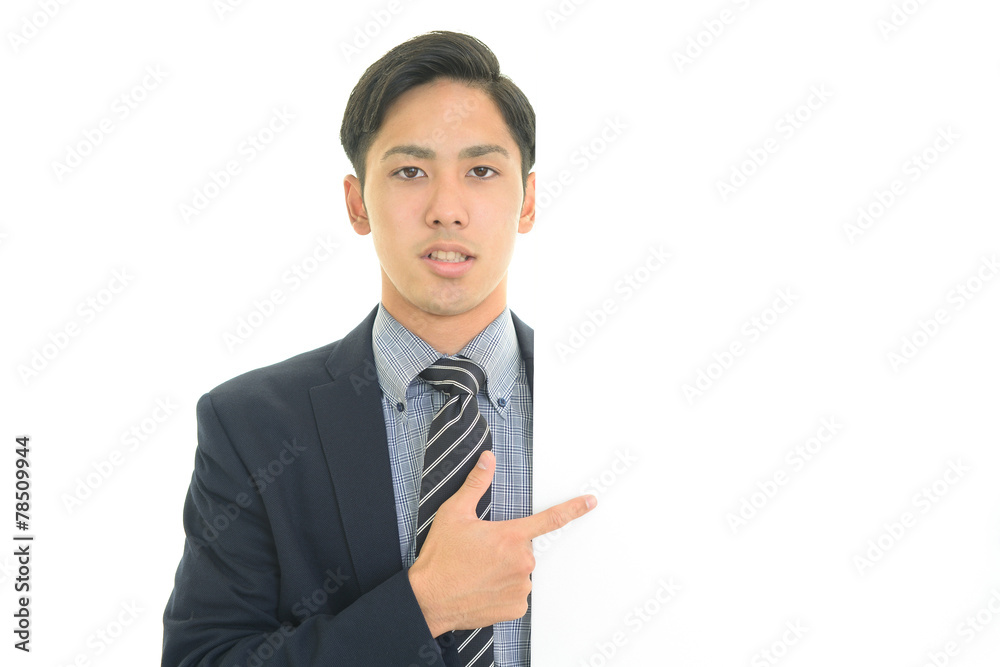 ホワイトボードを持つビジネスマン