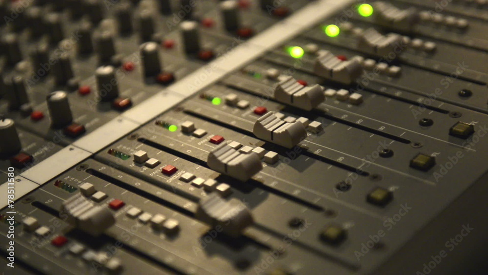 Analog audio mixing board with several channels Analog audio mixing board with several channels