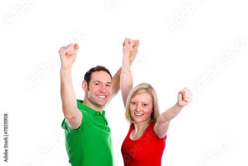 young couple with hands with arms up