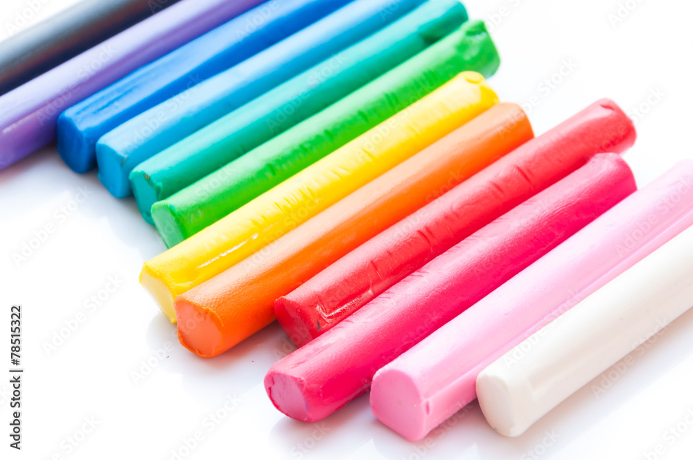 Rainbow colors plasticine play dough modeling clay isolated over Rainbow colors plasticine play dough modeling clay isolated over