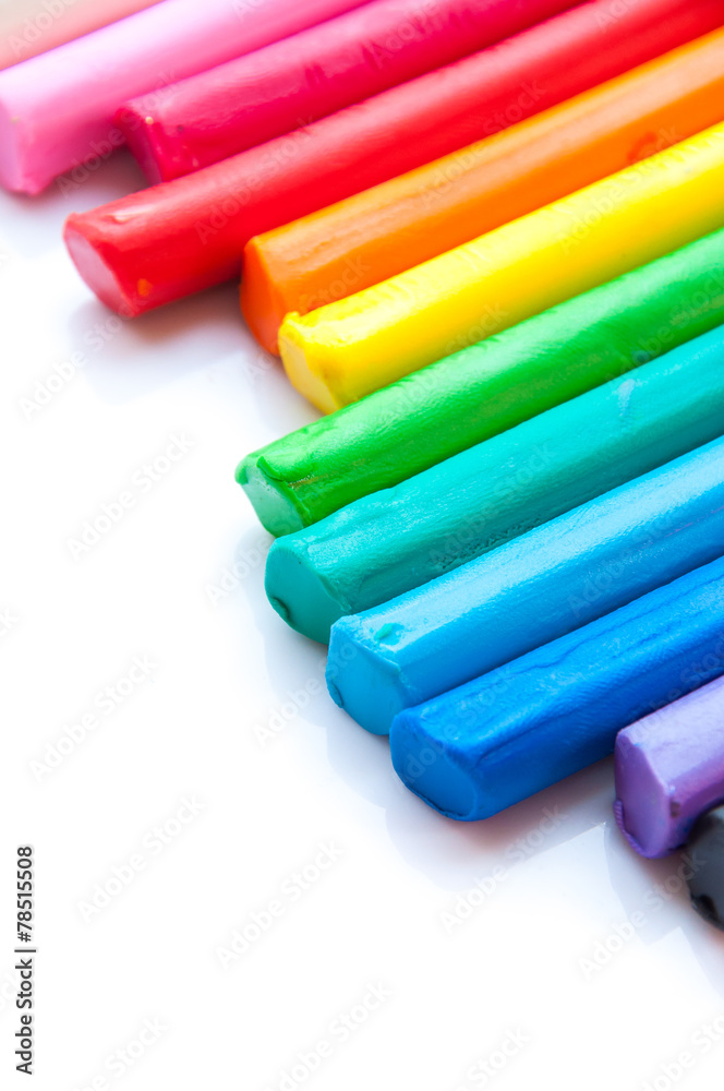 Rainbow colors plasticine play dough modeling clay isolated over Rainbow colors plasticine play dough modeling clay isolated over