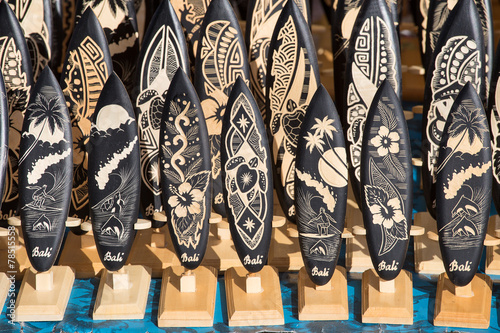 Souvenirs in the form of wooden surfboards in Bali