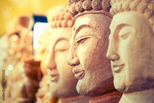 Fotografi Buddha cut from a tree,  in the studio