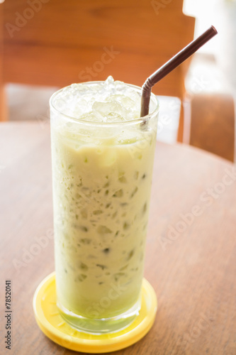 Glass of iced green tea latte
