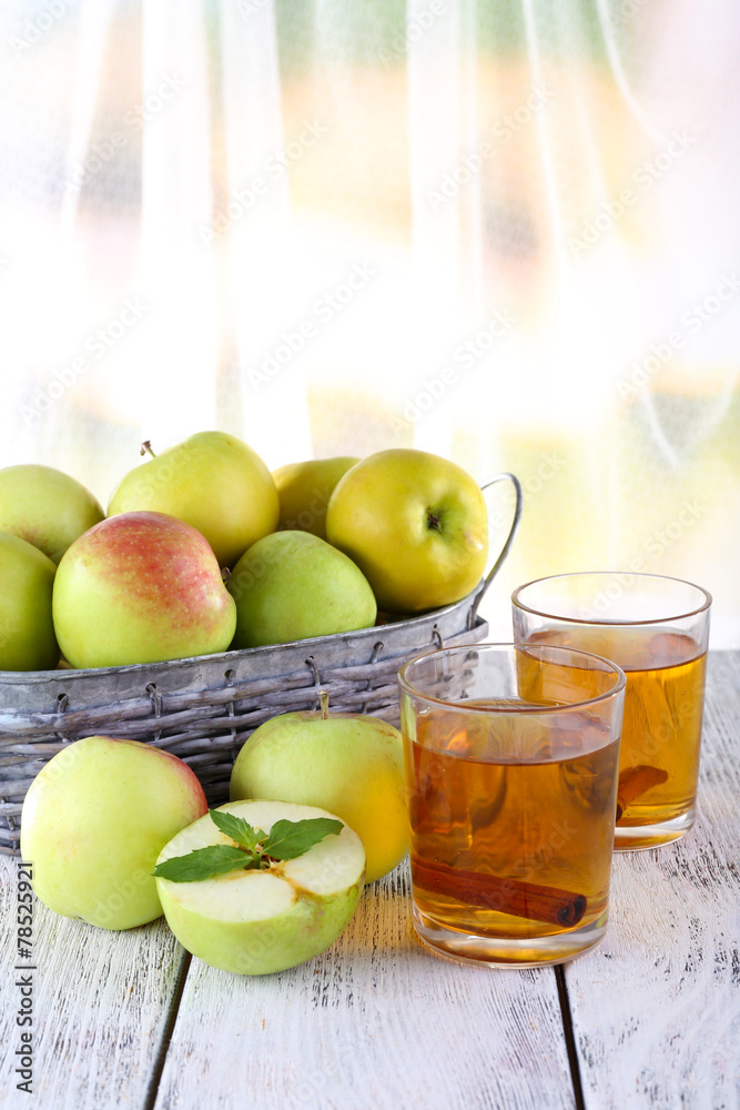 still life with apple cider and fresh apples on wooden table still life with apple cider and fresh apples on wooden table