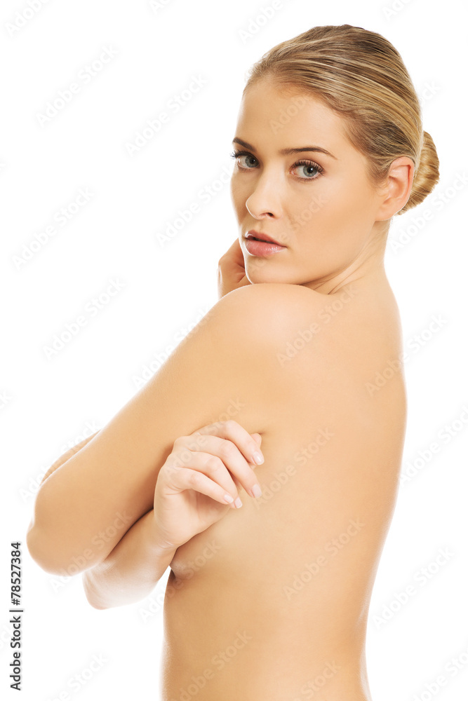 Portrait of nude woman covering her breast Portrait of nude woman covering her breast