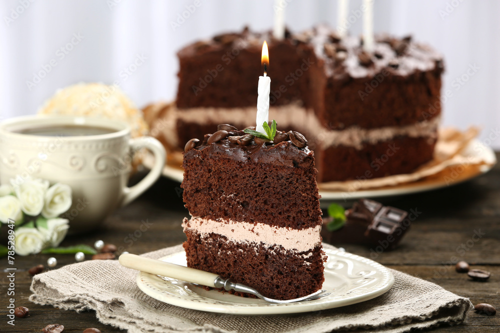 Delicious chocolate cake on table on light background Delicious chocolate cake on table on light background