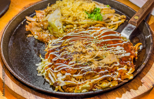  Okonomiyaki or japan pizza with hot iron frying