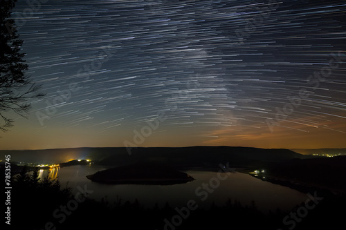 Star Trails Above Lake photo