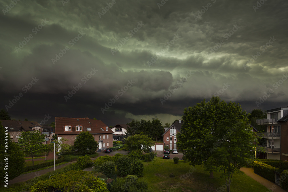Approaching Thunderstorm Over Residential District