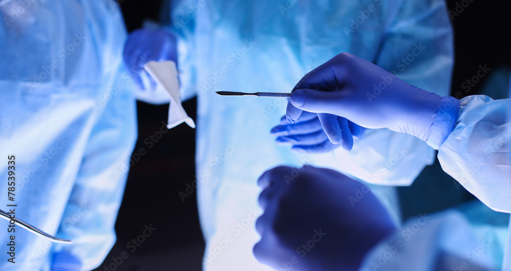Team surgeon at work in operating Team surgeon at work in operating