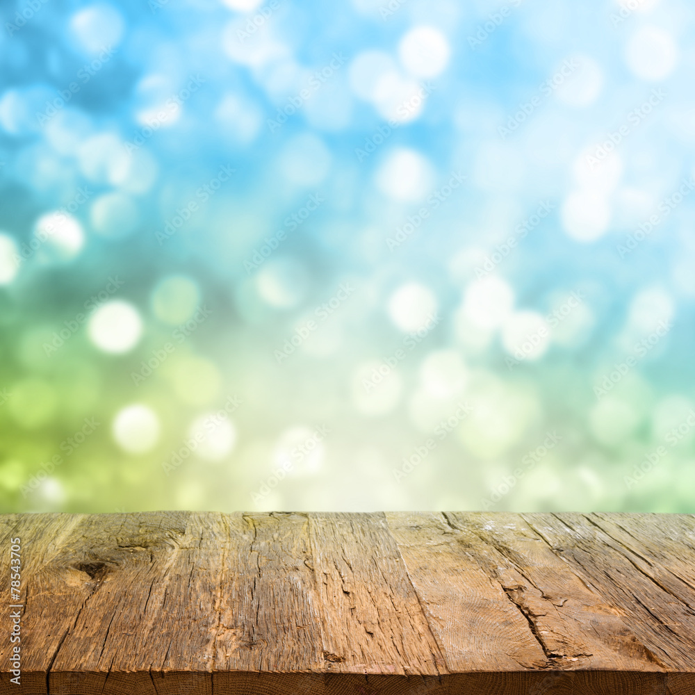 Table with bokeh background - obrazy, fototapety, plakaty 