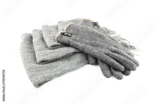 Woolen scarf and gloves isolated on white background
