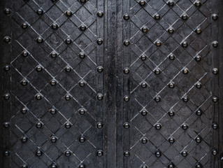 Fototapete Metall Metallic-Textur schwarze Elemente der alten Tür  © timonko