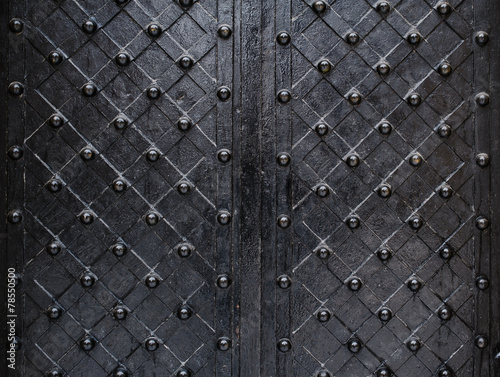 metallic texture black elements of the old door